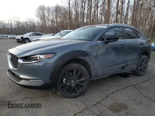 2023 Mazda CX-30 S Carbon Edition z VIN 3MVDMBCM3PM500403, wystawiony jako Copart lot #88146095 z przebiegiem 29 861 mil mil oraz Szkoda całkowita • Salvage title. Historia ofert i sprzedaży dostępna na DreamBid. Obrazek 1.