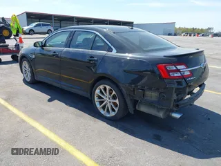 2015 Ford Taurus Limited with VIN 1FAHP2J81FG134973, listed as a IAAI auction lot 41845384 with 139,203 mi miles. Bid and sale history available at carsss.com. Image 3.