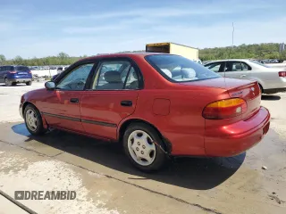 2001 Chevrolet Prizm z VIN 1Y1SK52861Z437836, wystawiony jako Copart lot #54050565 z przebiegiem 138 800 mil mil oraz Szkoda całkowita • Salvage title. Historia ofert i sprzedaży dostępna na DreamBid. Obrazek 2.