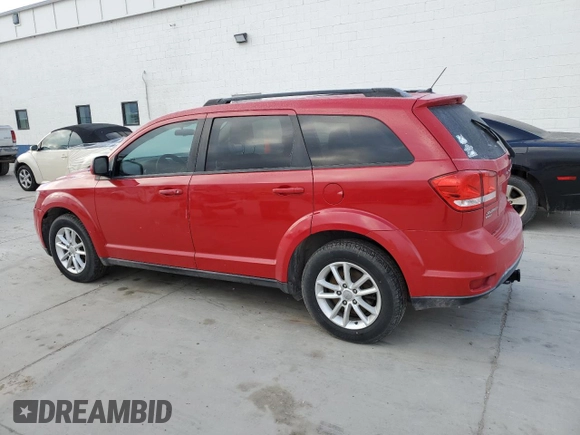 2013 Dodge Journey SXT with VIN 3C4PDDBG1DT593302, listed as a Copart auction lot 44517955 with 176,136 mi miles and Salvage title. Bid and sale history available at DreamBid. Image 2.