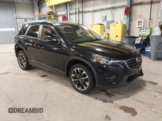2016 Mazda CX-5 Grand Touring with VIN JM3KE2DY9G0635368, listed as a IAAI auction lot 41699616 with 240,619 mi miles. Bid and sale history available at carsss.com. Image 1.