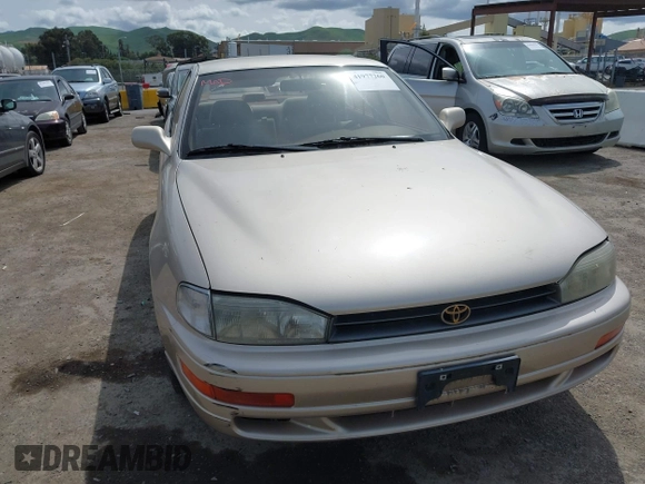 1993 Toyota Camry LE with VIN JT2SK12E6P0122365, listed as a IAAI auction lot 41977260 with 162,971 mi miles. Bid and sale history available at carsss.com. Image 6.
