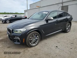 2019 BMW X4 M40i z VIN 5UXUJ5C59KLJ64026, wystawiony jako Copart lot #57390335 z przebiegiem 82 955 mil mil oraz Szkoda całkowita • Salvage title. Historia ofert i sprzedaży dostępna na DreamBid. Obrazek 1.