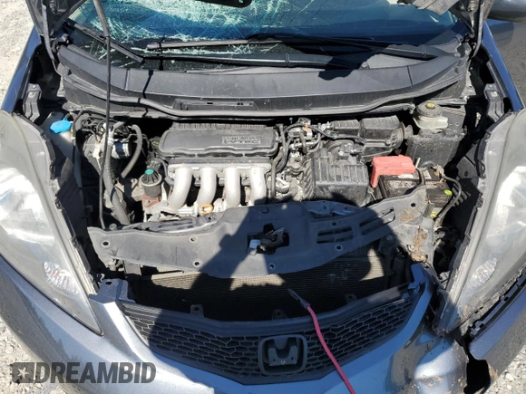2013 Honda Fit с VIN JHMGE8H34DC069516, выставлен на аукционе Copart как лот 59993335 с пробегом 128 798 миль миль и Списание • Salvage title. История ставок и продаж доступна на DreamBid. Изображение 11.