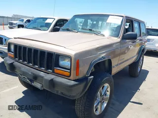 1999 Jeep Cherokee SE with VIN 1J4FF28S4XL592788, listed as a IAAI auction lot 42560002 with 189,258 mi miles and . Bid and sale history available at DreamBid. Image 2.