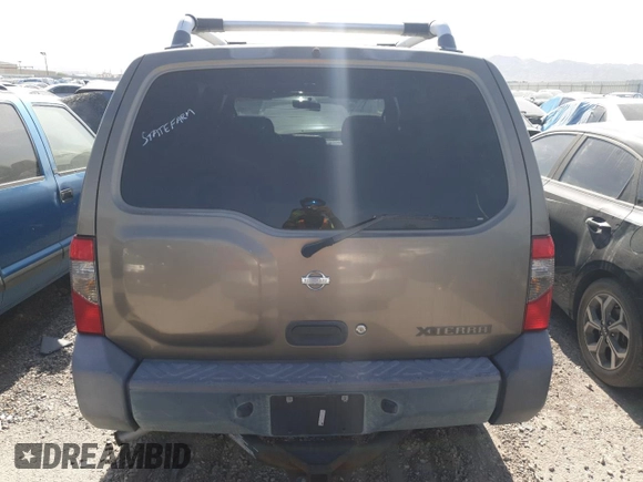 2001 Nissan Xterra XE with VIN 5N1ED28T91C541628, listed as a Copart auction lot 57712125 with 104,738 mi miles and Salvage title. Bid and sale history available at DreamBid. Image 6.