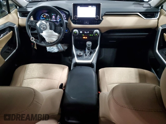 2019 Toyota RAV4 Hybrid XLE with VIN 2T3RWRFV1KW016526, listed as a Copart auction lot 61466435 with 64,255 mi miles and Salvage title. Bid and sale history available at DreamBid. Image 8.