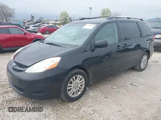 2009 Toyota Sienna XLE with VIN 5TDZK22C09S225520, listed as a IAAI auction lot 42126813 with 217,573 mi miles. Bid and sale history available at carsss.com. Image 2.