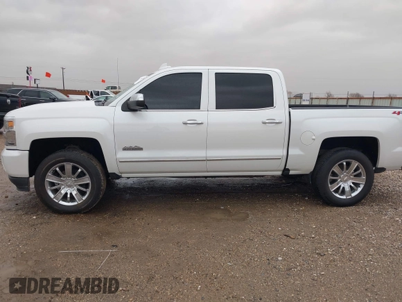 2018 Chevrolet Silverado 1500 High Country with VIN 3GCUKTEC1JG331991, listed as a IAAI auction lot 41718084 with 120,924 mi miles and . Bid and sale history available at DreamBid. Image 14.
