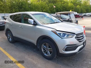 2018 Hyundai Santa Fe 2.4L with VIN 5XYZTDLB0JG539250, listed as a IAAI auction lot 42301642 with 148,035 mi miles and . Bid and sale history available at DreamBid. Image 1.