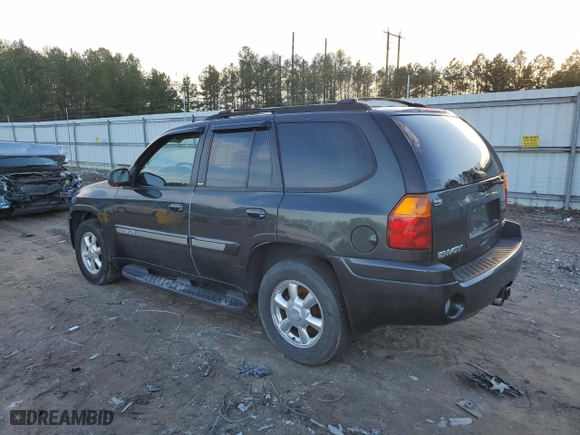 2004 GMC Envoy SLE with VIN 1GKDT13SX42397257, listed as a Copart auction lot 43580615 with 189,759 mi miles and Salvage Title. Bid and sale history available at carsss.com. Image 2.