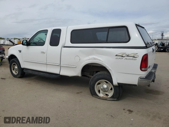 1998 Ford F-150 with VIN 1FTZX18W5WKB91459, listed as a Copart auction lot 52369095 with 185,660 mi miles and Salvage title. Bid and sale history available at DreamBid. Image 2.
