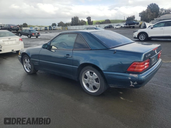 1999 Mercedes-Benz SL 500 with VIN WDBFA68F7XF177749, listed as a Copart auction lot 51460545 with 140,028 mi miles and Clean title. Bid and sale history available at DreamBid. Image 2.