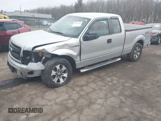 2014 Ford F-150 XL with VIN 1FTFX1EF2EFC81067, listed as a IAAI auction lot 41697190 with 105,584 mi miles. Bid and sale history available at carsss.com. Image 2.