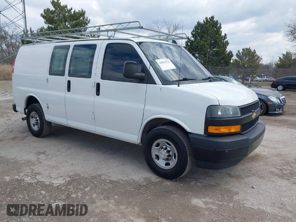2018 Chevrolet Express Cargo Van with VIN 1GCWGAFP6J1336229, listed as a IAAI auction lot 42022722 with 99,005 mi miles. Bid and sale history available at carsss.com. Image 1.