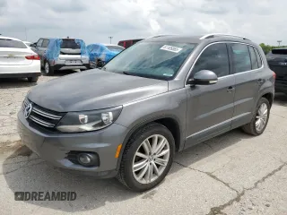 2012 Volkswagen Tiguan SE z VIN WVGAV7AX4CW001417, wystawiony jako Copart lot #61105865 z przebiegiem 168 110 mil mil oraz Czysty tytuł • Clean title. Historia ofert i sprzedaży dostępna na DreamBid. Obrazek 1.