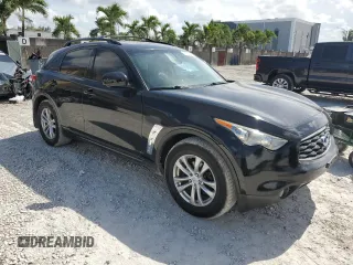 2014 Infiniti QX70 z VIN JN8CS1MU4EM451883, wystawiony jako Copart lot #61744725 z przebiegiem 60 393 mil mil oraz Czysty tytuł • Clean title. Historia ofert i sprzedaży dostępna na DreamBid. Obrazek 4.