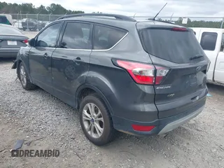 2017 Ford Escape SE z VIN 1FMCU0GD8HUE00754, wystawiony jako IAAI lot #42127911 z przebiegiem 169 487 mil mil oraz . Historia ofert i sprzedaży dostępna na DreamBid. Obrazek 3.