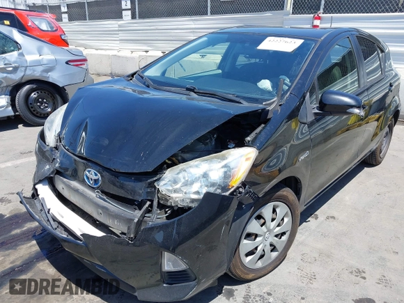 2012 Toyota Prius One z VIN JTDKDTB33C1017704, wystawiony jako IAAI lot #42227623 z przebiegiem 116 058 mil mil oraz . Historia ofert i sprzedaży dostępna na DreamBid. Obrazek 6.