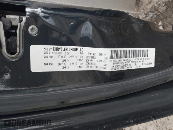 2012 Dodge Grand Caravan SXT with VIN 2C4RDGCG8CR242235, listed as a IAAI auction lot 41922083 with 124,306 mi miles and . Bid and sale history available at DreamBid. Image 9.