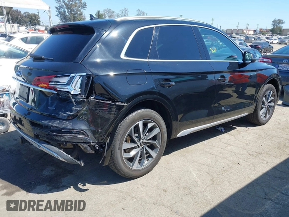 2021 Audi Q5 Premium Plus z VIN WA1BAAFY7M2114476, wystawiony jako IAAI lot #42063790 z przebiegiem 44 945 mil mil oraz . Historia ofert i sprzedaży dostępna na DreamBid. Obrazek 4.