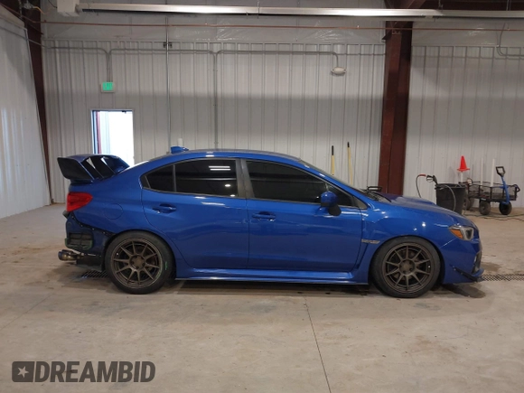 2015 Subaru WRX with VIN JF1VA1A61F9834946, listed as a IAAI auction lot 41636643 with 85,013 mi miles. Bid and sale history available at carsss.com. Image 14.