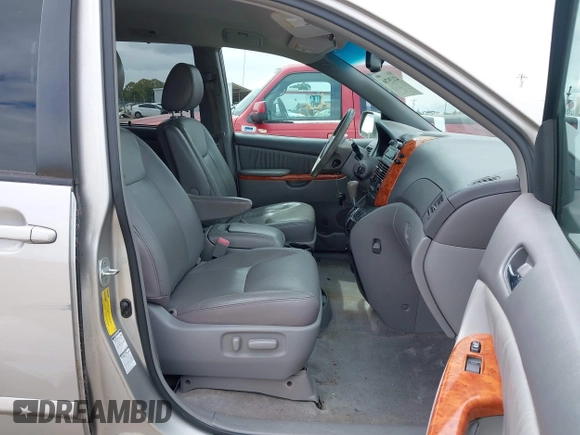 2009 Toyota Sienna XLE with VIN 5TDBK22C89S022909, listed as a IAAI auction lot 42139786 with 107,247 mi miles and . Bid and sale history available at DreamBid. Image 5.