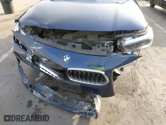 2020 BMW X2 sDrive28i with VIN WBXYH9C02L5P01502, listed as a IAAI auction lot 41397416 with 82,660 mi miles. Bid and sale history available at carsss.com. Image 12.