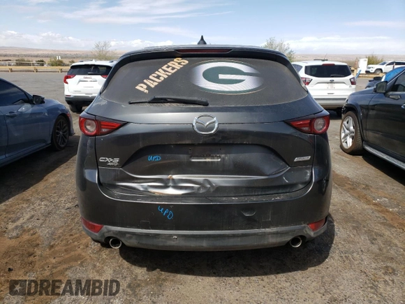 2018 Mazda CX-5 Grand Touring z VIN JM3KFBDM4J0300519, wystawiony jako Copart lot #51548745 z przebiegiem 102 853 mil mil oraz Szkoda całkowita • Salvage title. Historia ofert i sprzedaży dostępna na DreamBid. Obrazek 6.