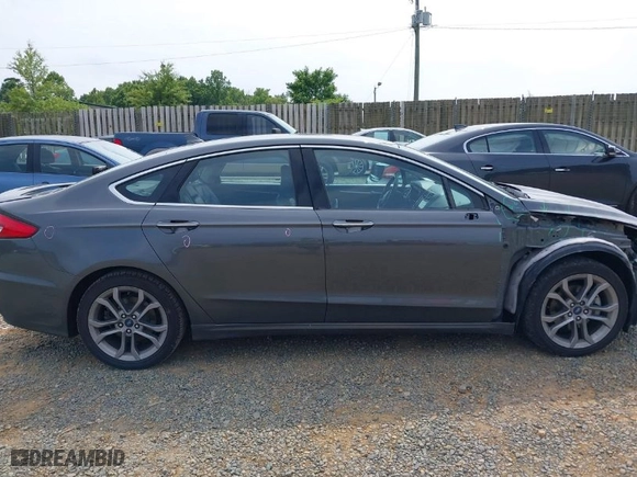 2020 Ford Fusion Hybrid Titanium with VIN 3FA6P0RU0LR141494, listed as a IAAI auction lot 39967898 with 88,152 mi miles. Bid and sale history available at carsss.com. Image 14.