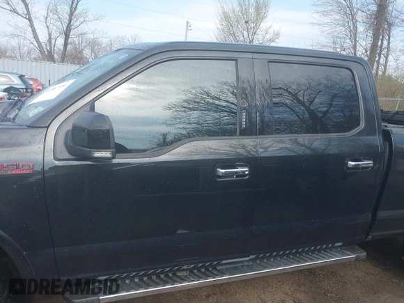2015 Ford F-150 XLT w/HD Payload Pkg with VIN 1FTFW1EF9FFA14450, listed as a IAAI auction lot 41867454 with 146,157 mi miles. Bid and sale history available at carsss.com. Image 14.