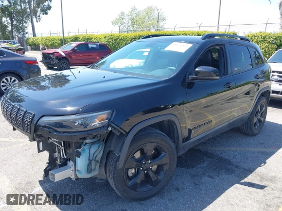2020 Jeep Cherokee Latitude Plus with VIN 1C4PJMLB8LD563861, listed as a IAAI auction lot 41973359 with 62,234 mi miles and . Bid and sale history available at DreamBid. Image 2.