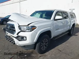 2017 Toyota Tacoma SR5 with VIN 3TMAZ5CN3HM045330, listed as a IAAI auction lot 41371012 with 20,170 mi miles and . Bid and sale history available at DreamBid. Image 18.