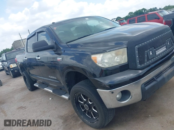 2013 Toyota Tundra Limited with VIN 5TFFY5F19DX142652, listed as a IAAI auction lot 42165369 with 152,286 mi miles and . Bid and sale history available at DreamBid. Image 1.