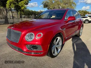 2017 Bentley Bentayga W12 z VIN SJAAC2ZV1HC014037, wystawiony jako Copart lot #54799655 z przebiegiem 36 099 mil mil oraz Szkody całkowita. Historia ofert i sprzedaży dostępna na DreamBid. Obrazek 1.