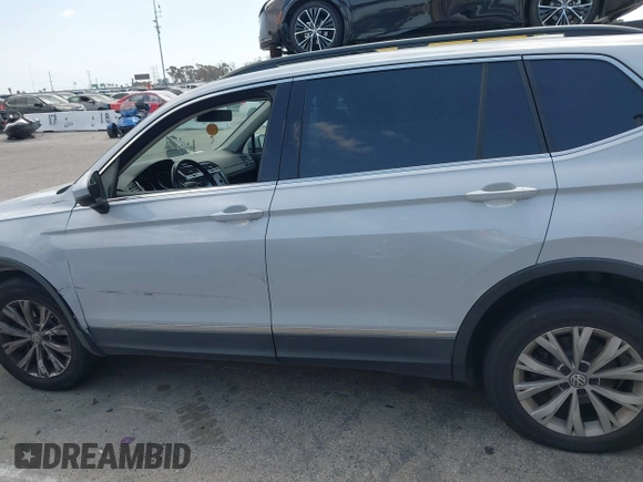 2018 Volkswagen Tiguan SEL with VIN 3VV2B7AX8JM105246, listed as a IAAI auction lot 41906838 with 110,749 mi miles and . Bid and sale history available at DreamBid. Image 14.