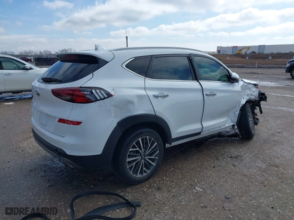 2021 Hyundai Tucson Limited with VIN KM8J33AL5MU410311, listed as a IAAI auction lot 41395702 with 55,562 mi miles. Bid and sale history available at carsss.com. Image 4.