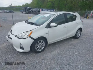 2014 Toyota Prius One with VIN JTDKDTB3XE1065493, listed as a IAAI auction lot 42063832 with 80,440 mi miles and . Bid and sale history available at DreamBid. Image 2.