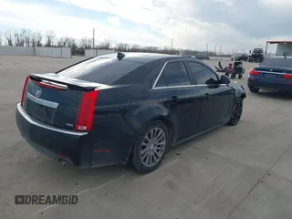 2013 Cadillac CTS Performance with VIN 1G6DJ5E37D0156897, listed as a IAAI auction lot 41359292 with 152,051 mi miles and . Bid and sale history available at DreamBid. Image 4.
