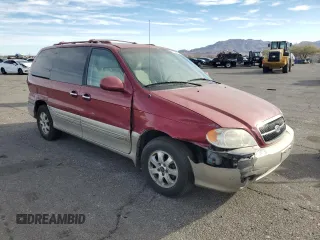 2004 Kia Sedona LX with VIN KNDUP131546612432, listed as a Copart auction lot 87326764 with 156,259 mi miles and Salvage Title. Bid and sale history available at carsss.com. Image 4.
