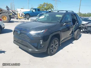 2024 Toyota RAV4 Hybrid XLE Premium with VIN JTMB6RFV9RD137409, listed as a IAAI auction lot 41758774 with 5,826 mi miles. Bid and sale history available at carsss.com. Image 17.
