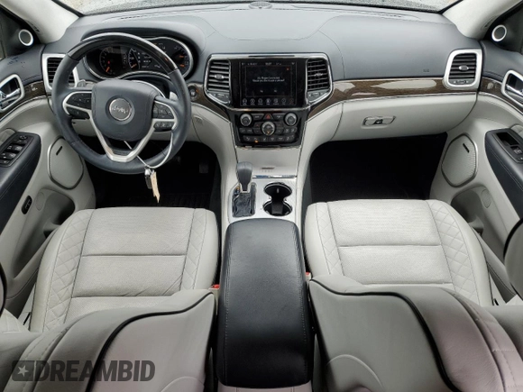 2019 Jeep Grand Cherokee Summit with VIN 1C4RJFJT4KC610260, listed as a Copart auction lot 59525215 with 38,303 mi miles and Salvage title. Bid and sale history available at DreamBid. Image 8.