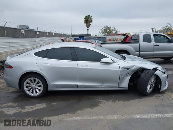 2016 Tesla Model S 90D with VIN 5YJSA1E23GF138925, listed as a IAAI auction lot 42408676 with 48,399 mi miles and . Bid and sale history available at DreamBid. Image 13.