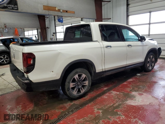 2017 Honda Ridgeline RTL-E with VIN 5FPYK3F72HB002890, listed as a Copart auction lot 57699735 with 128,813 mi miles and Salvage title. Bid and sale history available at DreamBid. Image 3.