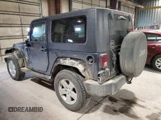 2007 Jeep Wrangler Sahara with VIN 1J4FA54127L127598, listed as a Copart auction lot 44049475 with 222,867 mi miles and Salvage title. Bid and sale history available at DreamBid. Image 2.