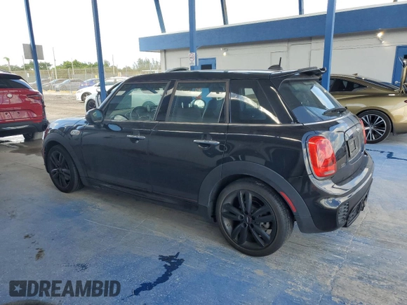 2018 MINI Hardtop 4 Door Cooper S with VIN WMWXU3C54J2F51176, listed as a Copart auction lot 64896135 with 16,418 mi miles and Salvage title. Bid and sale history available at DreamBid. Image 2.
