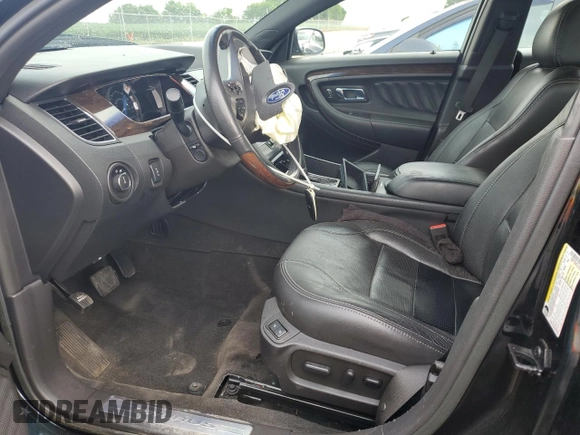 2015 Ford Taurus Limited with VIN 1FAHP2F84FG118324, listed as a Copart auction lot 63366325 with 89,306 mi miles and Salvage title. Bid and sale history available at DreamBid. Image 7.