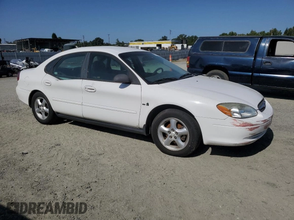 2000 Ford Taurus LX with VIN 1FAFP5222YA168638, listed as a Copart auction lot 60710415 with 119,948 mi miles and Salvage title. Bid and sale history available at DreamBid. Image 4.