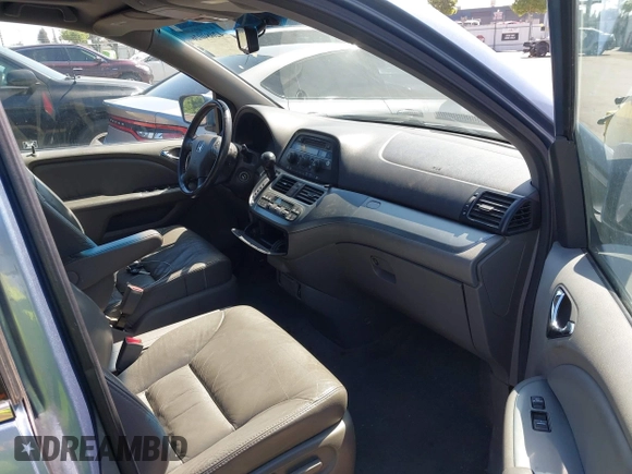 2010 Honda Odyssey EX-L with VIN 5FNRL3H64AB071603, listed as a IAAI auction lot 42084026 with 199,753 mi miles. Bid and sale history available at carsss.com. Image 5.