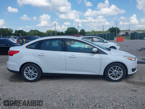 2015 Ford Focus SE with VIN 1FADP3F2XFL335884, listed as a IAAI auction lot 42582740 with 102,036 mi miles and . Bid and sale history available at DreamBid. Image 13.
